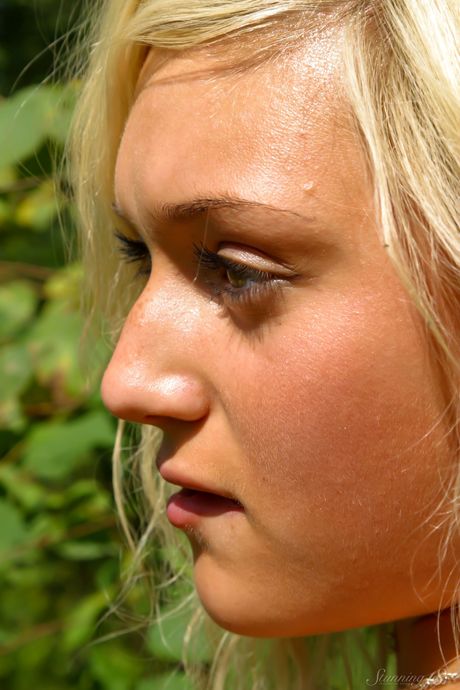 Barely legal blonde Quinby B models totally naked without embarrassment