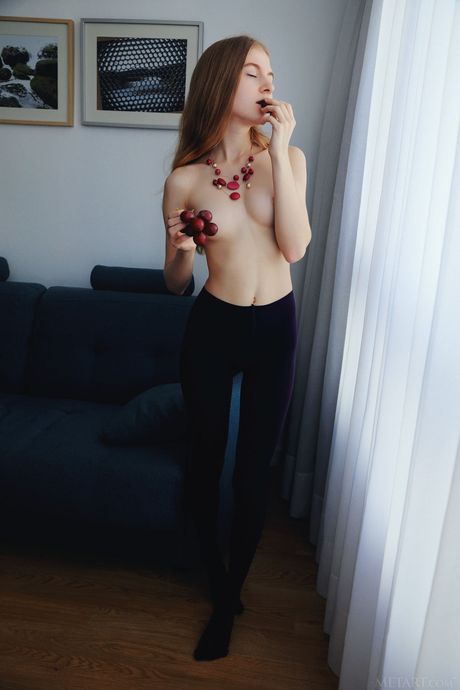 Delicate teen Shayla removes her pantyhose and poses naked