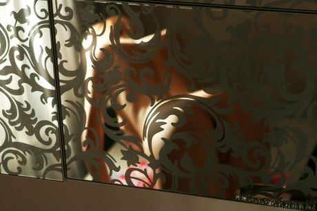 Sexy blonde teen Kira W removes her lingerie and stockings to get naked