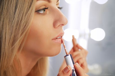 Young blonde Lija takes a selfie before getting naked on a bed