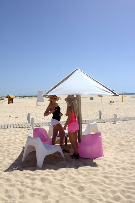 Hot teen girls Eve Angel & Jo get naked in the sunshine on a balcony