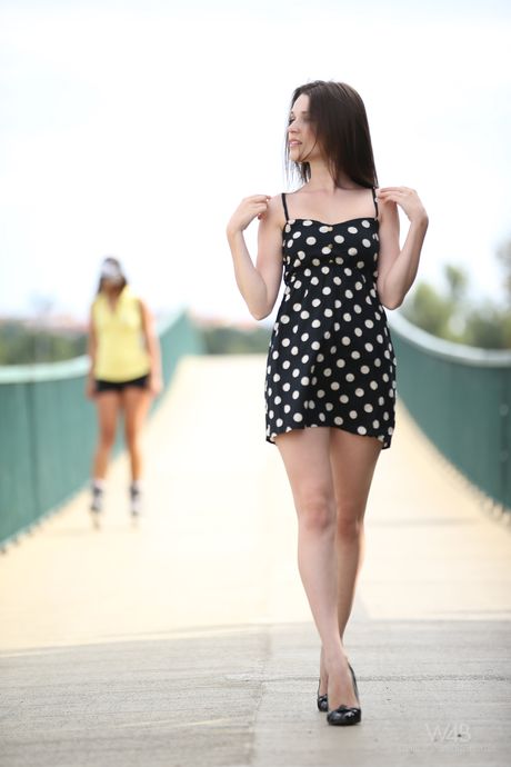 Glamorous teen Serena shows off her natural tits and her bald pussy in public