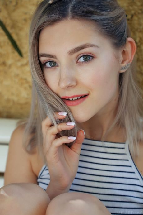 Eva Elfie is a beautiful girl with a slim figure and a slender body