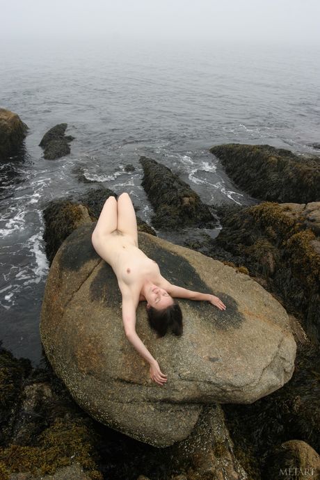 Delicate teenage amateur posing naked outdoor and showing her hairy cunt