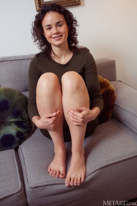 Angelic teen Arcadia gets completely naked on a balcony