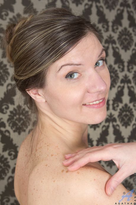 Sexy MILF Agatha shows off her tiny tits and her hairy pussy