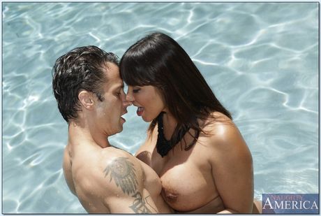 Brunette mom Ava Devine seduces a young man while wearing a bikini