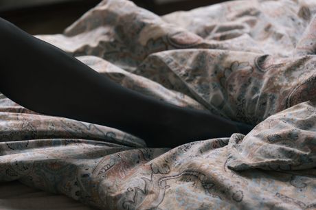 Ukrainian lady Mara Blake fingers her pussy while wearing black pantyhose