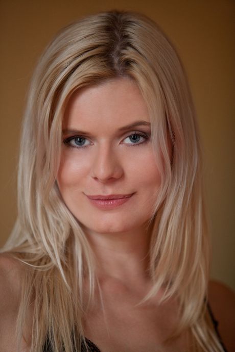 British teen Luka B presents her tiny tits and bald pussy in the nude