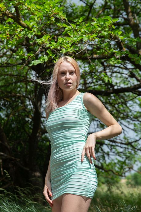 Blonde teen Maria Rubio bares herself on a kitchen counter