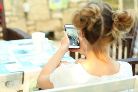 Thin teen Nedda takes selfies while getting naked on a seaside cliff