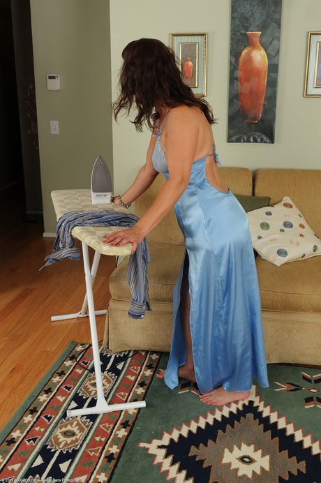 Mature housewife Chane strips and shows her big ass and holes