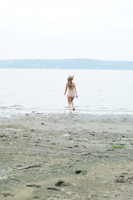 Svelte teen Bridgit A reveals her naked form in the forest & shows her tiny tits & pussy