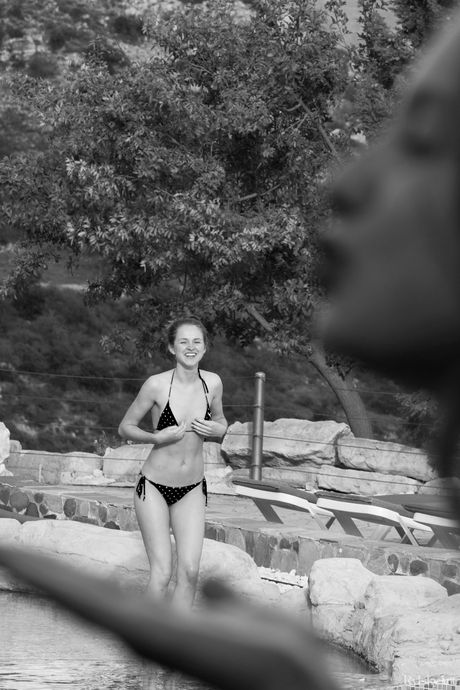 Sexy redhead Alice May poses naked in the forest and shows her flexibility