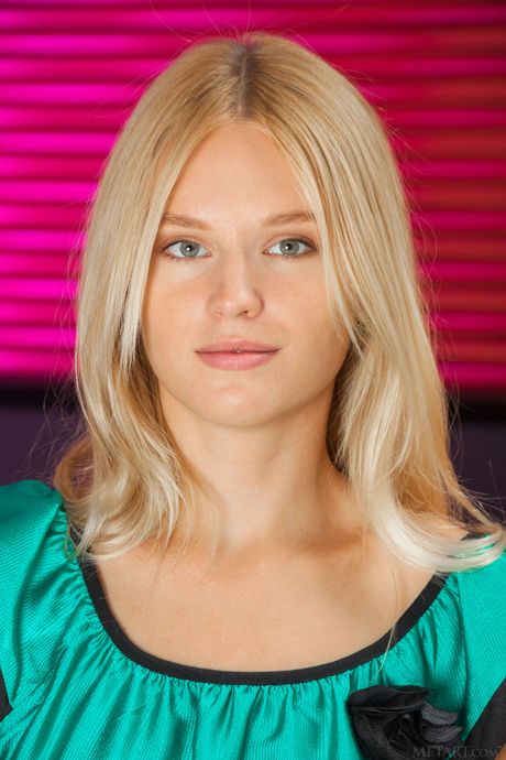 Young blonde Xena strips down with conviction