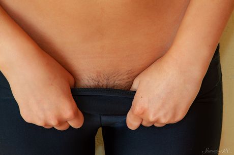 Adorable teen Irina J highlights her landing strip pussy while totally naked