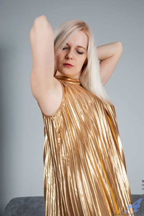 Blonde MILF in stockings Baby Doll shows her shaved pussy up close