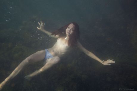 Sweet Ukrainian girl Korica A gets naked on a sun lounger in the backyard