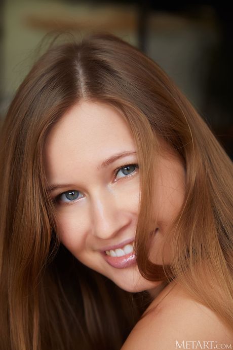 Perfect teen Stella Cardo exhibits her big tits and poses naked