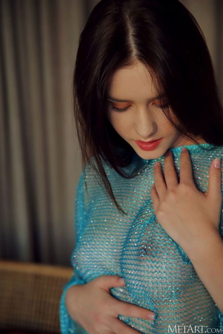 Pretty teen Kacy Lane removes a crocheted top to pose nude with grace