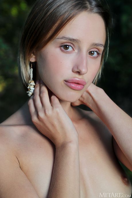 Hot teen Vetra removes her lingerie and shows her hairy pussy in nature