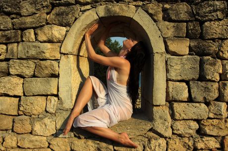 Janelle B flaunts her beautiful body as she masturbates on the rocky cliff