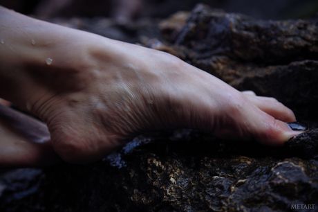 Russian venus Indiana A models totally naked on a rocky beach