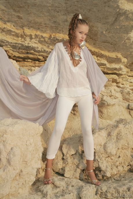 Love Hairy: Lovely teen Milena D strips and poses nude in the middle of a rocky field