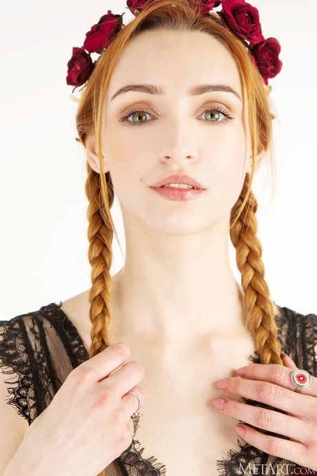 Slender teen Morrigan shows her tiny tits and poses naked