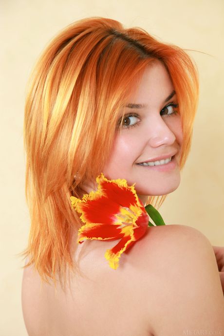 Ukrainian beautiful Violla A removes her lingerie to pose nude in a solo