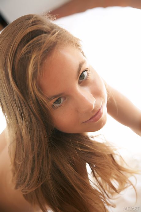 Gorgeous teen Altea B removes her dress to pose nude in high heels