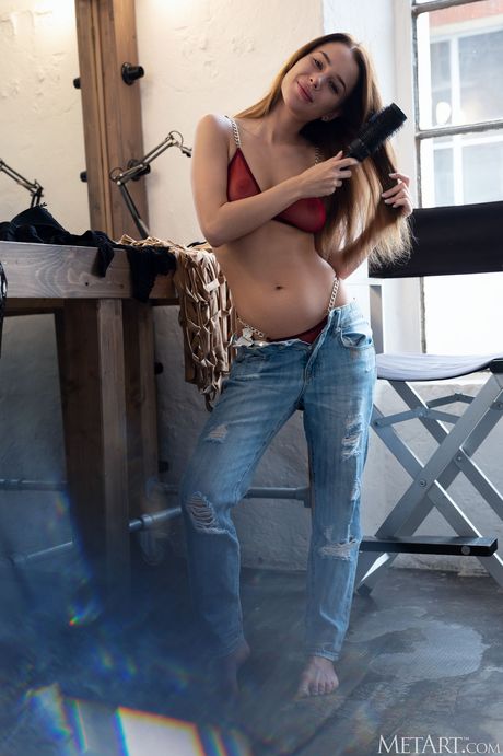 Cute teen Paulina Pulse removes her lingerie and jeans to pose nude