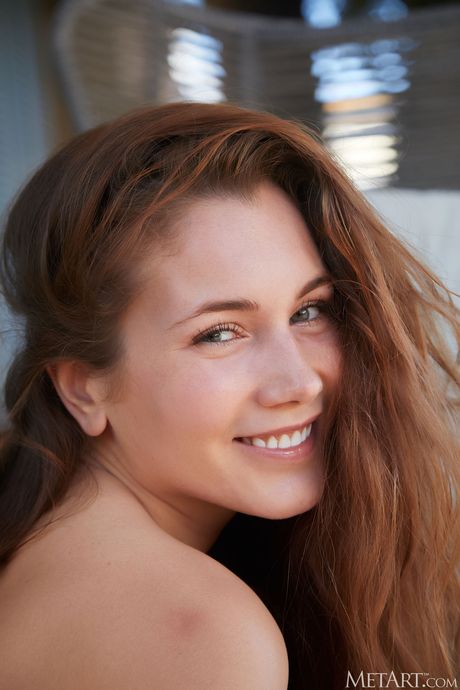 Mary Rock displays her sexy body and poses on the terrace