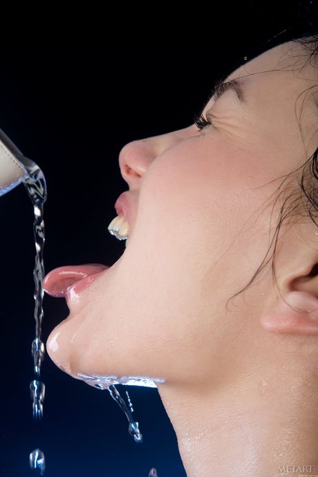 Slender teen Loreen A exhibits her big tits and poses naked