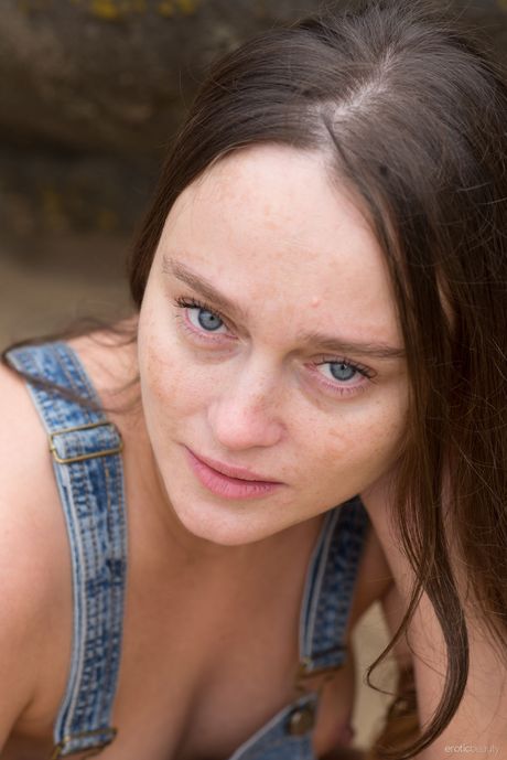 Thin teen Alice Koks gets naked in a field of wheat