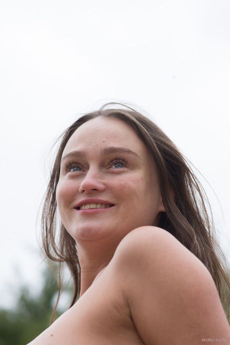 Thin teen Alice Koks gets naked in a field of wheat