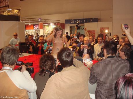 18-year-old blonde Nella A gets naked in a pair of thigh-high boots