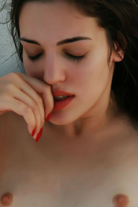 Magnetic teen Ines strips & poses nude in the ocean & on the beach