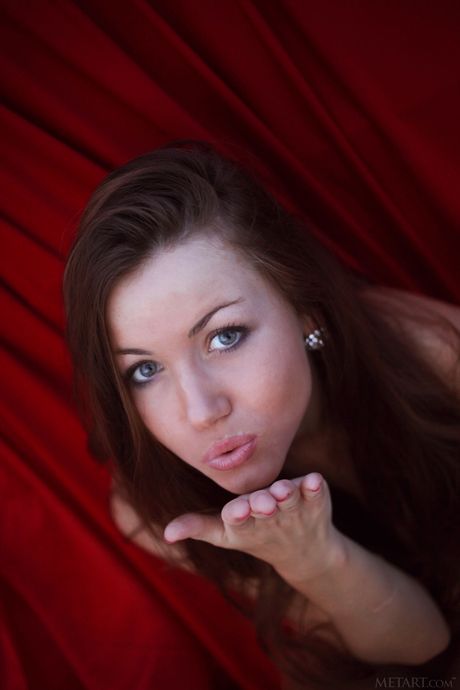 Sexy Ukrainian girl Firebird A strips & poses nude on the balcony