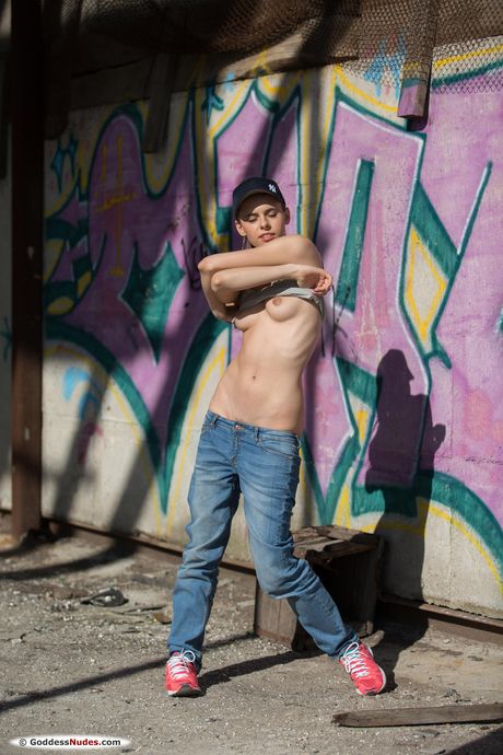 Skinny teen Gracie strips and poses nude in the middle of the road