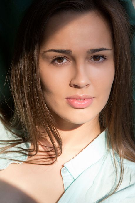 Russian babe Trista A showing her big tits and her shaved pussy