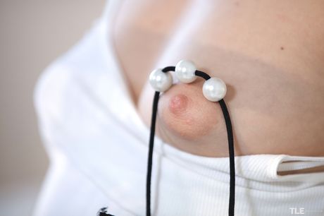 Blue Angel strips off her bikini and masturbates her pussy with a pink panty