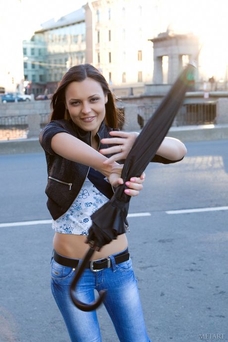 Svelte teen Taini A highlights her big tits and poses naked