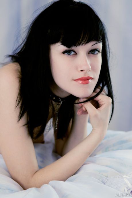 Ukrainian belle Cecile A removes her bikini and stockings to pose nude