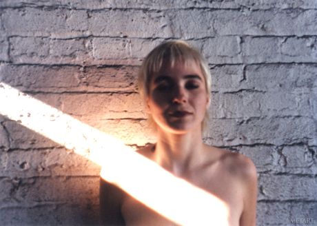 Sexy Canadian teen Ronin poses naked on a rocky beach during a solo shoot