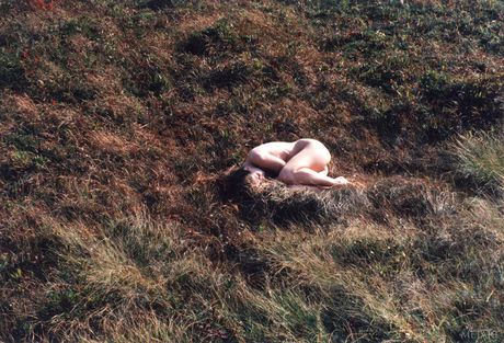 Sexy Canadian teen Ronin poses naked on a rocky beach during a solo shoot