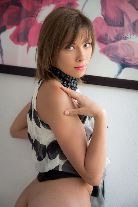 Slender teen Eddison gets naked without embarrassment during a solo shoot