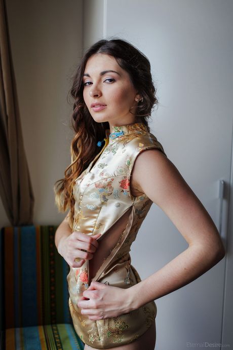 Delicate teen Lukki Lima shows her small tits and shaved pussy in a solo