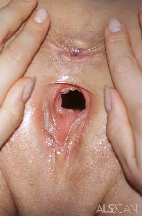 Blonde teen Anna fingers her pussy after getting naked on a sofa