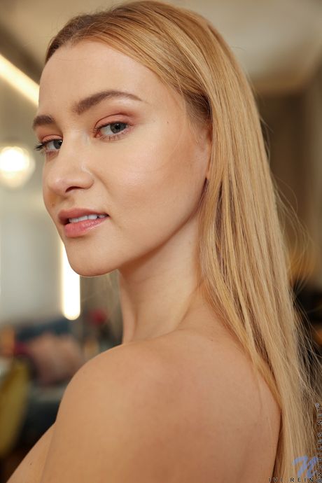 Sexy teen Ivi Rein shows her slim body and poses in a pair of socks